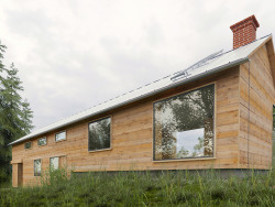 Maison en bois dans la forêt