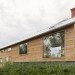 Maison en bois dans la forêt