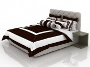 Cama com roupa de chocolate branco