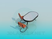 Table ovale avec chaises