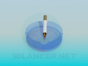 Ashtray with cigarette