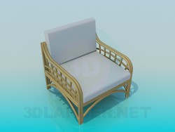 Chaise avec accoudoirs en osier et jambes