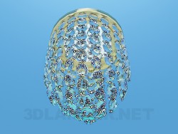 A small lamp decorated with transparent glass beads