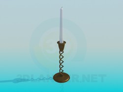 Una vela en un candelero