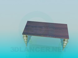 Table with scalloped legs