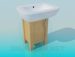 Küçük bir ahşap dolap üzerinde büyük lavabo